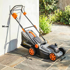 Cordless lawn mower on patio with orange grips and light grey deck, side view