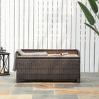 Rattan storage bench with lid closed, dark woven sides and tan seat slats.