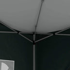 Green pop-up gazebo interior with white metal support frame and ceiling canopy
