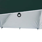 Underside of dark green beach umbrella with gray canopy and hanging attachment grommet