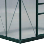 Dark green greenhouse base frame with transparent polycarbonate panels and corner supports