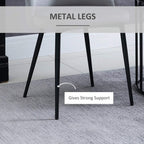Grey upholstered dining chair with black metal legs and padded seat