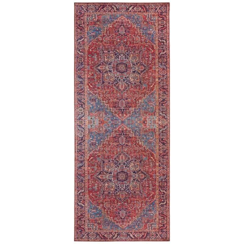 Narrow red oriental area rug with blue medallion motifs and decorative border.