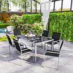 Outdoor dining set with tempered glass-top table and black mesh stackable chairs