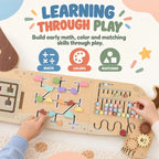 Hands using wooden dachshund busy board panel with shape slider and math beads