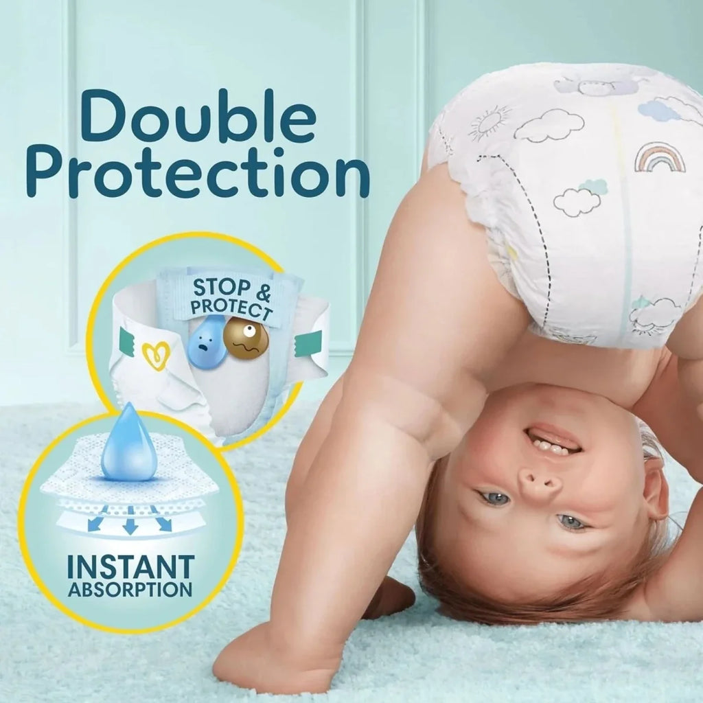 Baby diaper with double protection and instant absorption feature icons