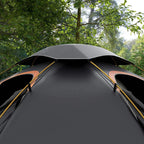 Grey dome tent roof with orange trim lines and curved ventilation panels