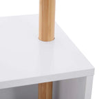 Close-up of natural bamboo pole attached to white storage bench cubby