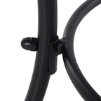 Black metal bistro table leg joint with reinforced welded connection