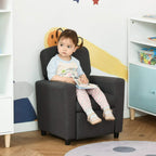 Grey kids armchair sofa with attached footrest, shown with a child seated