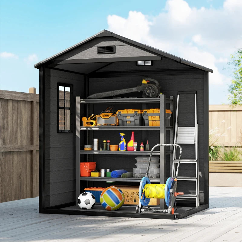 Dark grey resin storage shed with open double doors showing shelving and ladder