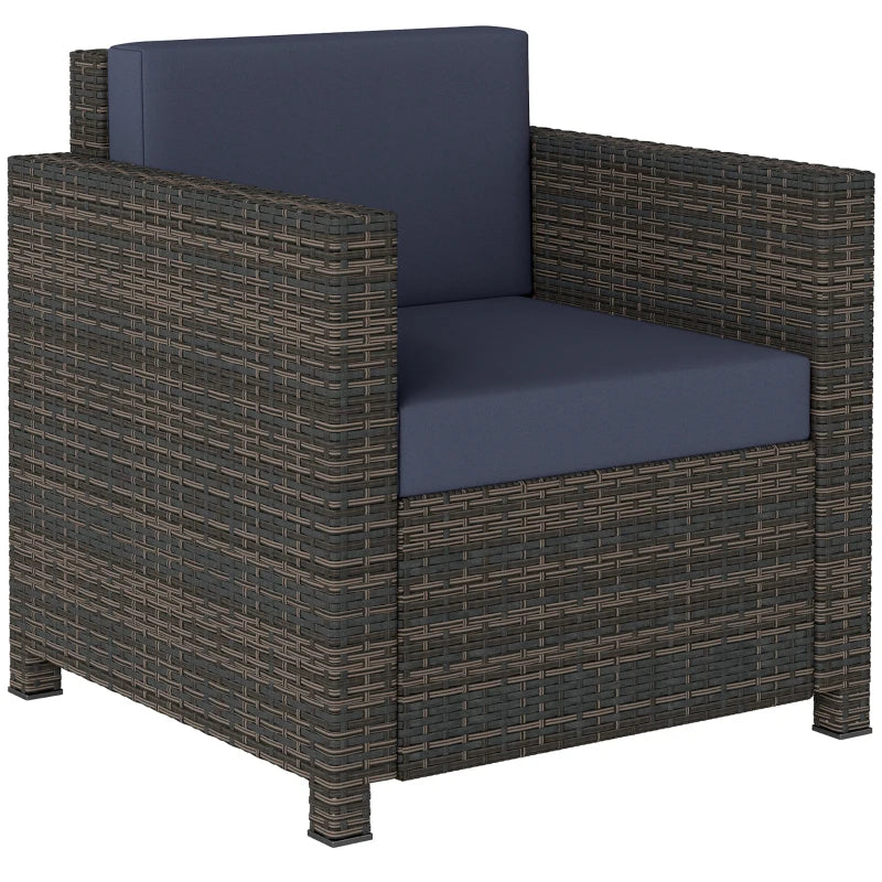 Rattan garden armchair with navy cushion, mixed brown woven frame and armrests.