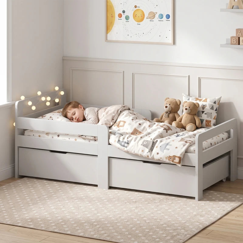 Grey kids bed frame with guard rails and two storage drawers, full bed view