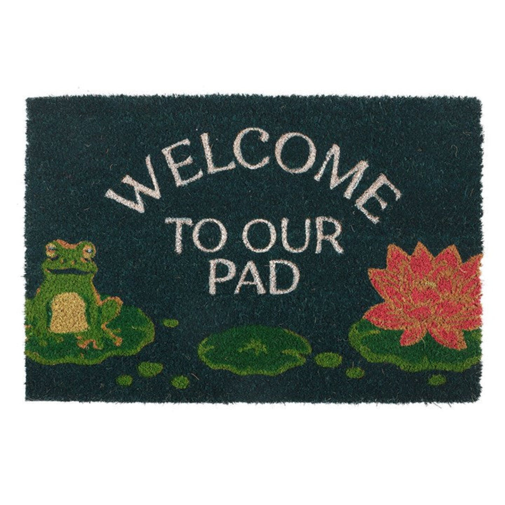 Doormat with a frog and lily pad design and 'Welcome to our pad' text.