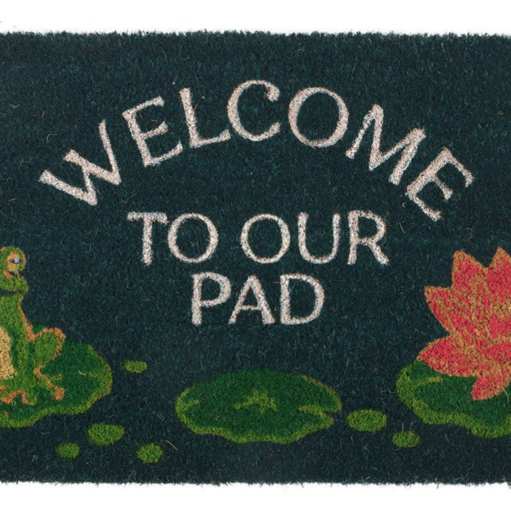 Doormat with 'Welcome to our pad' text and frog and lily pad designs.