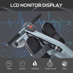 Grey rowing machine LCD monitor display with control buttons near the handlebars