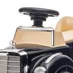 Front view of black Mercedes-Benz 300S ride-on car with beige steering console