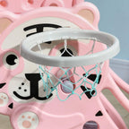 Close-up of pink animal-shaped basketball hoop frame with net and rim