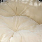 Close-up of cream removable cushion fabric with stitched, tufted look