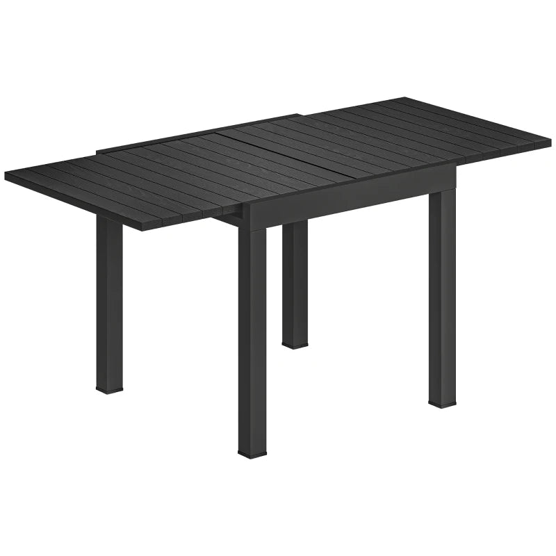 Black aluminium extending outdoor dining table with faux wood slatted top and legs
