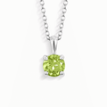Sterling silver solitaire pendant necklace with round peridot-green gemstone