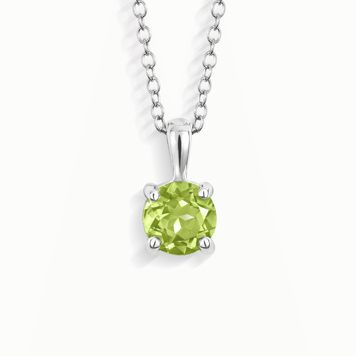 Sterling silver solitaire pendant necklace with round peridot-green gemstone