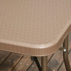 Dark brown rattan-style dining chair seat with woven texture and rounded edge