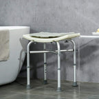 Height-adjustable white shower stool with curved seat, padded cushion, and non-slip feet