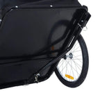 Black-and-white bike cargo trailer close-up of side panel and covered rear wheel