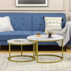 Two round nested tables with white marble-look tops and gold metal frames
