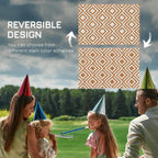 Brown outdoor rug with repeating diamond lattice pattern, reversible design