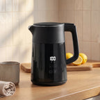 Black electric kettle with LED temperature display and curved pour spout