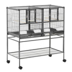 Large black bird cage with divider and slide tray, two-tier wire bars