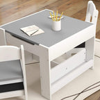 White kids table with grey tabletop and open side cubby storage beside chair