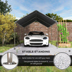 Grey heavy-duty carport canopy with black roof over white car, stabilized by anchored poles