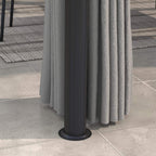 Grey gazebo canopy corner post with gathered curtains at the base