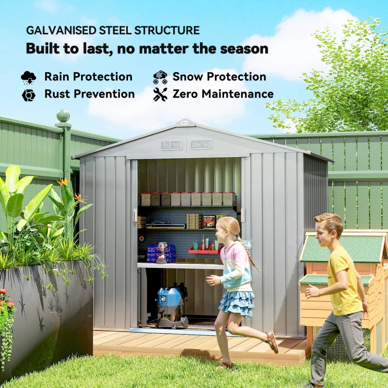 Light grey metal garden storage shed with open double doors and interior tools visible.