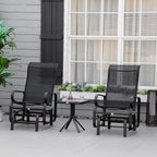 Black outdoor gliding chair set with glass-top coffee table on patio, two chairs