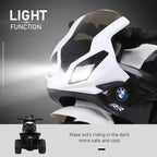 Kids electric ride-on motorbike with bright front headlight and black-and-white body styling.