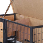 Interior view of elevated pet hutch showing wire mesh walls and slide-out collection tray