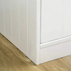 White raised pet feeder side view with paneled cabinet and base