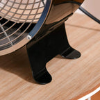 Black table fan base with anti-slip feet and protective metal grille