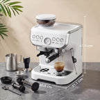 White coffee machine with grinder hopper, steam wand, and espresso cup