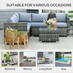 Grey rattan sectional sofa set with light-blue cushions and glass coffee table on patio