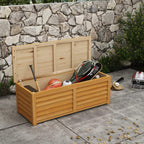 Light brown wooden deck storage box with lid open, storing outdoor items