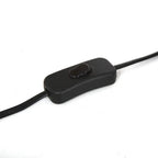 Black inline power switch on the lamp cord