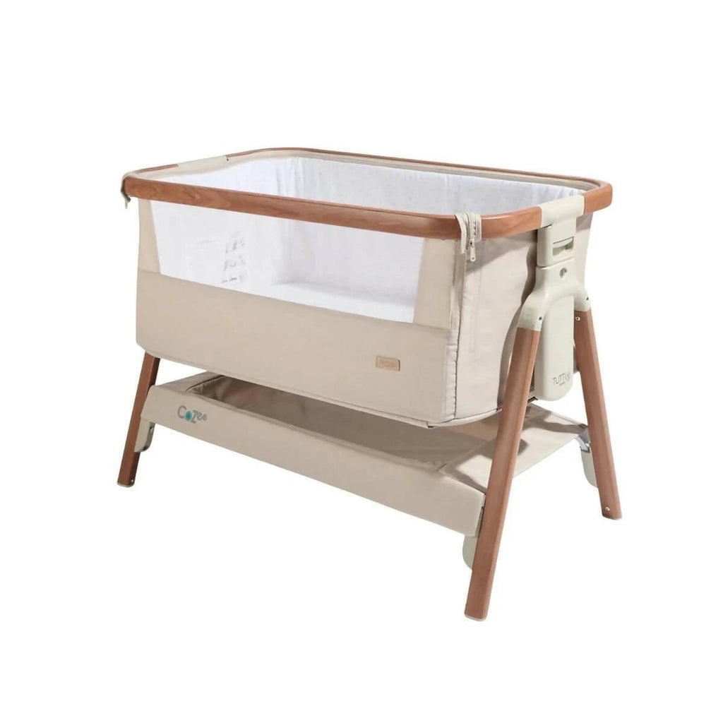 Scandinavian bedside crib with ecru fabric and walnut wood frame, padded bassinet