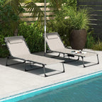 Pair of khaki sun loungers with padded headrests, reclining legs, and black metal frames
