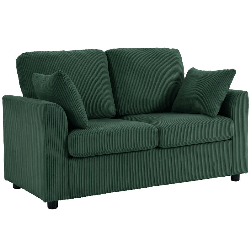 Dark green corduroy 2-seat sofa with two throw pillows and tufted cushions