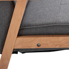 Grey upholstered accent armchair seat with beech wood leg and tufted back detail